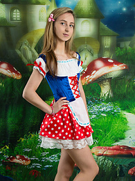 FreeKiloPics presents: Very hot blonde teen beauty in an adorable outfit slowly takes it off to reveal her nice and perky boobs