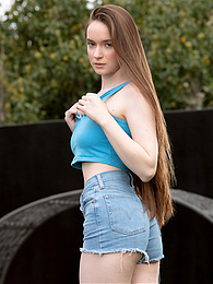 FreeKiloPics presents: Beautiful Brunette Teen Hazel Shows Off Her Hairy Pussy and Masturbates Outdoors.