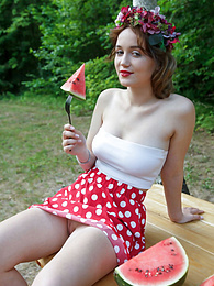 FreeKiloPics presents: Nice belarusian stunner Rokki removes all clothes on a blanket in a backyard